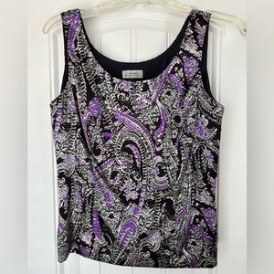 Tahari sleeveless blouse with side zipper.  Fully lined size 6.